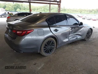 2019 Infiniti Q50 Luxe z VIN JN1EV7AR8KM594171, wystawiony jako IAAI lot #42428037 z przebiegiem 70 086 mil mil oraz . Historia ofert i sprzedaży dostępna na DreamBid. Obrazek 4.