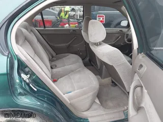 1999 Honda Civic VP with VIN 2HGEJ6617XH537283, listed as a IAAI auction lot 41483084 with 153,655 mi miles. Bid and sale history available at carsss.com. Image 8.