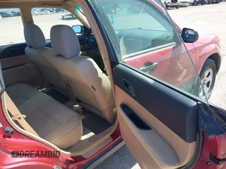 2003 Subaru Forester X with VIN JF1SG63683H763340, listed as a IAAI auction lot 42141223 with 157,378 mi miles. Bid and sale history available at carsss.com. Image 8.