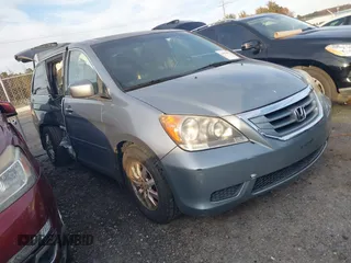 2008 Honda Odyssey EX-L with VIN 5FNRL38758B050245, listed as a IAAI auction lot 41358323 with 145,010 mi miles and . Bid and sale history available at DreamBid. Image 1.