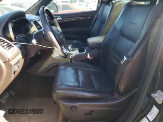 2014 Jeep Grand Cherokee Summit с VIN 1C4RJEJG4EC245676, выставлен на аукционе Copart как лот 46925295 с пробегом 130 394 миль миль и Списание • Salvage title. История ставок и продаж доступна на DreamBid. Изображение 7.