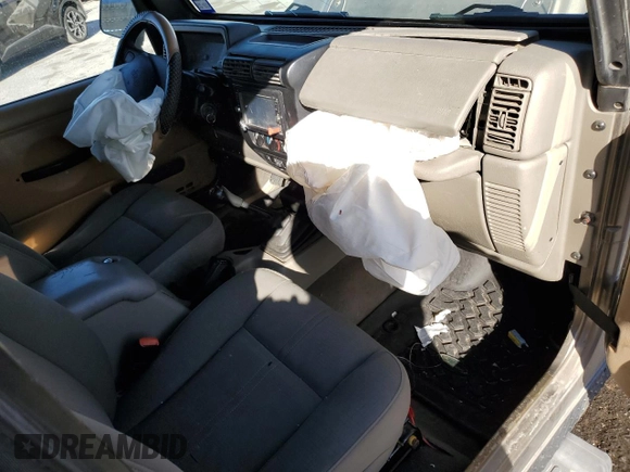 2003 Jeep Wrangler Sahara z VIN 1J4FA59S43P369233, wystawiony jako Copart lot #46517565 z przebiegiem 169 232 mil mil oraz Szkoda całkowita • Salvage title. Historia ofert i sprzedaży dostępna na DreamBid. Obrazek 8.
