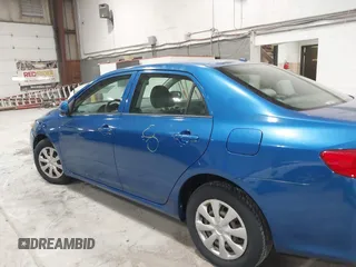 2009 Toyota Corolla with VIN JTDBL40E699037792, listed as a IAAI auction lot 41838231 with 199,690 mi miles. Bid and sale history available at carsss.com. Image 13.