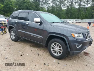 2014 Jeep Grand Cherokee Limited with VIN 1C4RJFBG2EC233725, listed as a Copart auction lot 58524505 with 216,798 mi miles and Salvage title. Bid and sale history available at DreamBid. Image 4.