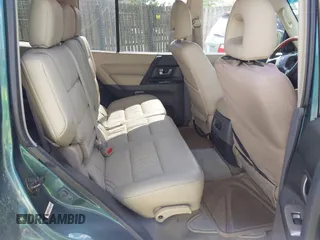 2003 Mitsubishi Montero Limited z VIN JA4NW51S03J040380, wystawiony jako IAAI lot #42144872 z przebiegiem 220 017 mil mil oraz . Historia ofert i sprzedaży dostępna na DreamBid. Obrazek 8.