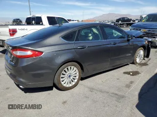 2016 Ford Fusion SE Hybrid with VIN 3FA6P0LU3GR307666, listed as a Copart auction lot 57444365 with 127,786 mi miles and Salvage title. Bid and sale history available at DreamBid. Image 3.