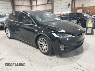 2019 Tesla Model X P90D with VIN 5YJXCAE4XKF180356, listed as a IAAI auction lot 42087926 with 79,041 mi miles. Bid and sale history available at carsss.com. Image 1.