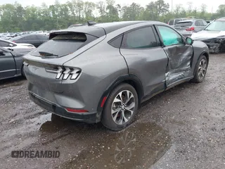 2023 Ford Mustang Mach-E Premium with VIN 3FMTK3SU4PMA76915, listed as a IAAI auction lot 42350153 with 3,957 mi miles and . Bid and sale history available at DreamBid. Image 4.