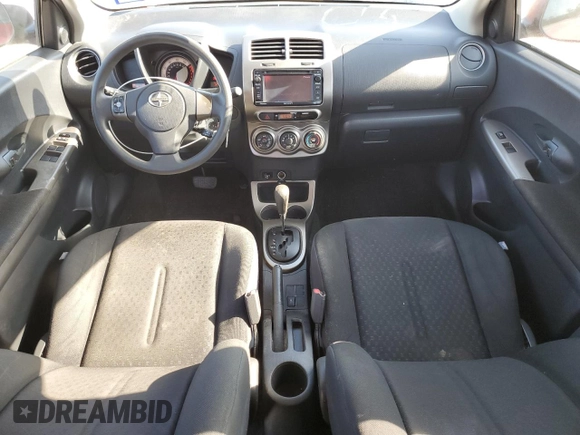 2014 Scion xD with VIN JTKKUPB49E1041940, listed as a Copart auction lot 52449285 with 32,109 mi miles and Salvage title. Bid and sale history available at DreamBid. Image 8.