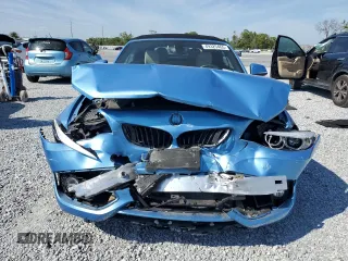 2018 BMW 2 Series 230i xDrive with VIN WBA2K1C58JVD41067, listed as a Copart auction lot 49325465 with 32,442 mi miles and Salvage Title. Bid and sale history available at carsss.com. Image 5.