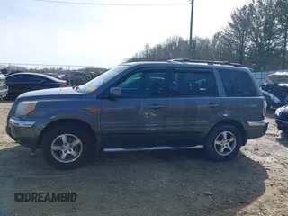 2007 Honda Pilot EX-L with VIN 5FNYF28737B001928, listed as a IAAI auction lot 41311134 with 243,870 mi miles. Bid and sale history available at carsss.com. Image 14.