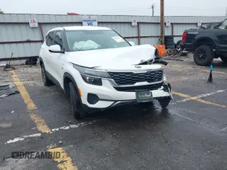 2021 Kia Seltos LX with VIN KNDEPCAA8M7048918, listed as a IAAI auction lot 42363049 with 48,014 mi miles and . Bid and sale history available at DreamBid. Image 1.