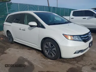 2015 Honda Odyssey Touring Elite with VIN 5FNRL5H9XFB121921, listed as a IAAI auction lot 41858551 with 61,506 mi miles and . Bid and sale history available at DreamBid. Image 1.