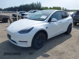 2023 Tesla Model Y Long Range with VIN 7SAYGDEE4PF676167, listed as a IAAI auction lot 42147909 with 20,488 mi miles. Bid and sale history available at carsss.com. Image 20.