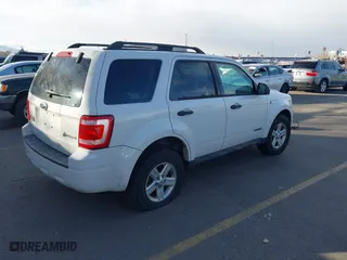 2008 Ford Escape Hybrid with VIN 1FMCU59H58KD75563, listed as a IAAI auction lot 41939067 with 127,609 mi miles. Bid and sale history available at carsss.com. Image 4.