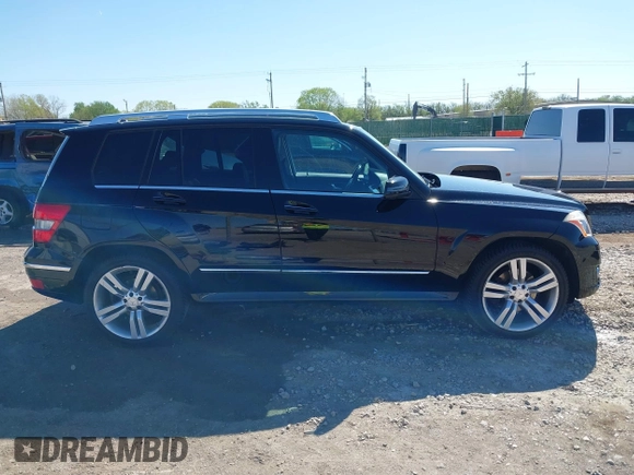 2012 Mercedes-Benz GLK GLK 350 with VIN WDCGG8HB6CF841198, listed as a IAAI auction lot 42021083 with 162,930 mi miles. Bid and sale history available at carsss.com. Image 14.