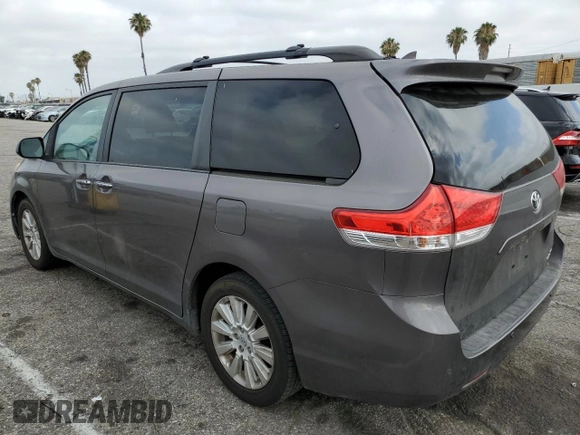 2014 Toyota Sienna Limited с VIN 5TDDK3DC6ES084587, выставлен на аукционе Copart как лот 62018095 с пробегом 152 124 миль миль и Списание • Salvage title. История ставок и продаж доступна на DreamBid. Изображение 2.