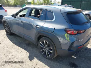 2023 Mazda CX-50 S Premium Plus with VIN 7MMVABEM8PN108020, listed as a IAAI auction lot 42203568 with 26,783 mi miles and . Bid and sale history available at DreamBid. Image 3.