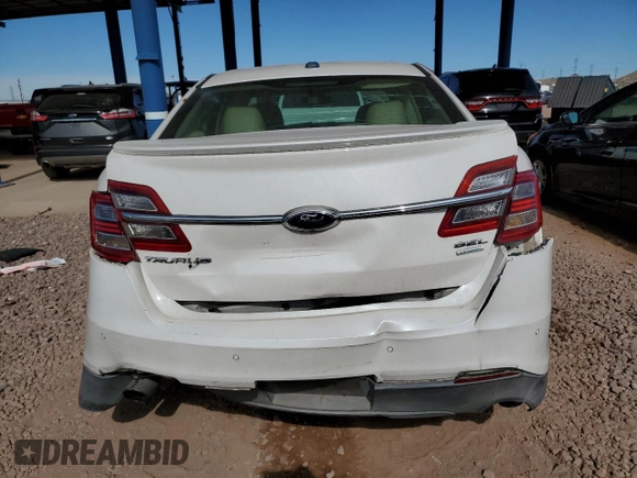 2015 Ford Taurus SEL with VIN 1FAHP2E92FG172960, listed as a Copart auction lot 79465914 with 115,115 mi miles and Salvage Title. Bid and sale history available at DreamBid. Image 6.