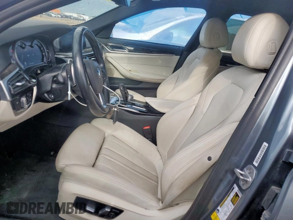 2018 BMW 5 Series 530i z VIN WBAJA5C51JWA37384, wystawiony jako Copart lot #55061215 z przebiegiem 113 809 mil mil oraz Szkody całkowita. Historia ofert i sprzedaży dostępna na DreamBid. Obrazek 7.