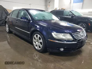 2004 Volkswagen Phaeton V8 z VIN WVWAF63D848008651, wystawiony jako Copart lot #78267004 z przebiegiem 146 193 mil mil oraz Szkody całkowita. Historia ofert i sprzedaży dostępna na DreamBid. Obrazek 4.