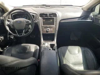 2018 Ford Fusion Titanium z VIN 3FA6P0D96JR155318, wystawiony jako Copart lot #53740505 z przebiegiem 86 567 mil mil oraz Szkoda całkowita • Salvage title. Historia ofert i sprzedaży dostępna na DreamBid. Obrazek 8.