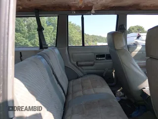 1990 Jeep Cherokee with VIN 1J4FJ38L1LL100497, listed as a IAAI auction lot 37253812 with 214,943 mi miles and . Bid and sale history available at DreamBid. Image 8.