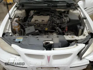 2001 Pontiac Grand Am z VIN 1G2NV12E61M551201, wystawiony jako Copart lot #47700635 z przebiegiem Nie podano mil oraz Nie do naprawy • Non repairable. Historia ofert i sprzedaży dostępna na DreamBid. Obrazek 11.