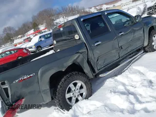 2010 GMC Canyon SLE1 with VIN 1GTJTCDE6A8127051, listed as a IAAI auction lot 41366245 with 147,516 mi miles. Bid and sale history available at carsss.com. Image 6.