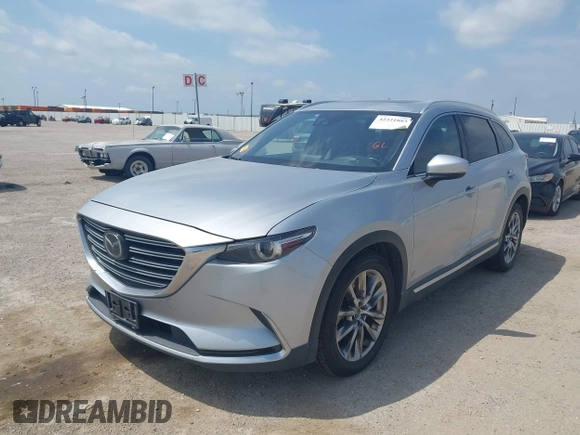 2016 Mazda CX-9 Signature with VIN JM3TCBEY9G0117785, listed as a IAAI auction lot 42331883 with 115,096 mi miles and . Bid and sale history available at DreamBid. Image 17.