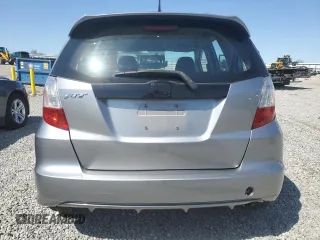 2009 Honda Fit Sport z VIN JHMGE88489S010278, wystawiony jako Copart lot #52251405 z przebiegiem 120 511 mil mil oraz Szkoda całkowita • Salvage title. Historia ofert i sprzedaży dostępna na DreamBid. Obrazek 6.