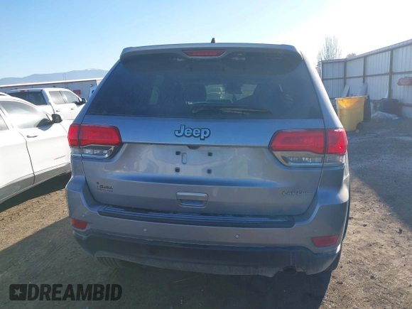 2018 Jeep Grand Cherokee Laredo E with VIN 1C4RJEAG9JC126080, listed as a IAAI auction lot 41355941 with 108,919 mi miles and . Bid and sale history available at DreamBid. Image 16.