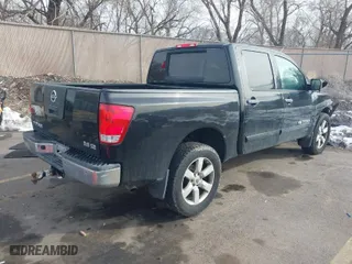2010 Nissan Titan SE with VIN 1N6AA0EC7AN302682, listed as a IAAI auction lot 41619128 with 181,486 mi miles. Bid and sale history available at carsss.com. Image 4.