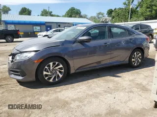 2018 Honda Civic EX с VIN 19XFC2F74JE013652, выставлен на аукционе Copart как лот 57755535 с пробегом 117 570 миль миль и Списание • Salvage title. История ставок и продаж доступна на DreamBid. Изображение 1.