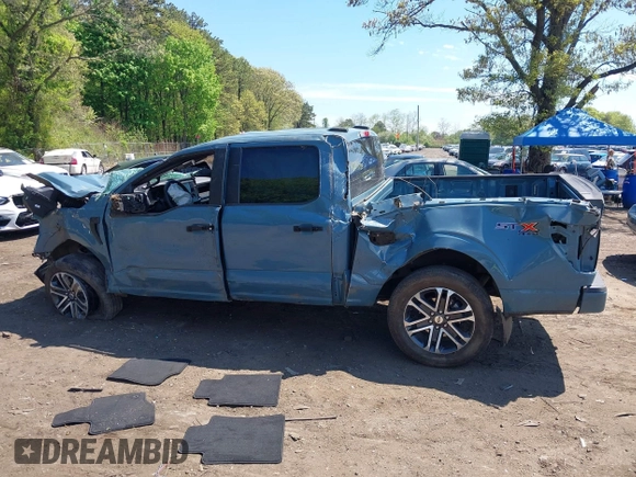 2023 Ford F-150 XL with VIN 1FTFW1E53PKD99214, listed as a IAAI auction lot 42211755 with 31 mi miles and . Bid and sale history available at DreamBid. Image 14.