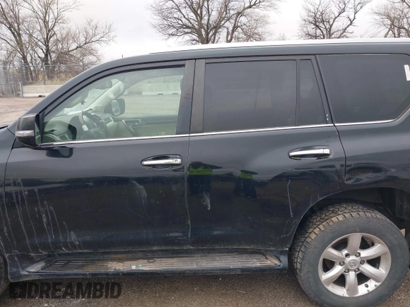2011 Lexus GX 460 with VIN JTJBM7FXXB5021029, listed as a IAAI auction lot 41944230 with 209,722 mi miles. Bid and sale history available at carsss.com. Image 14.