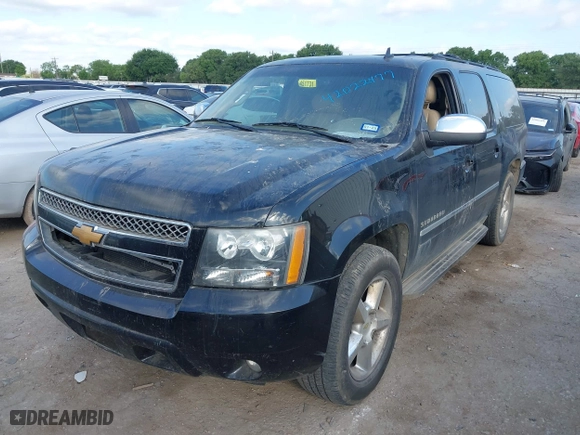 2014 Chevrolet Suburban LTZ with VIN 1GNSCKE08ER220808, listed as a IAAI auction lot 42022477 with 192,488 mi miles. Bid and sale history available at carsss.com. Image 19.