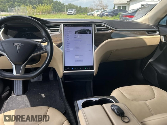 2014 Tesla Model S 60 z VIN 5YJSA1H11EFP44322, wystawiony jako Copart lot #59038135 z przebiegiem 146 015 mil mil oraz Czysty tytuł • Clean title. Historia ofert i sprzedaży dostępna na DreamBid. Obrazek 9.