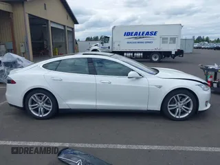 2016 Tesla Model S 90D with VIN 5YJSA1E21GF121962, listed as a IAAI auction lot 42130291 with 114,670 mi miles and . Bid and sale history available at DreamBid. Image 14.