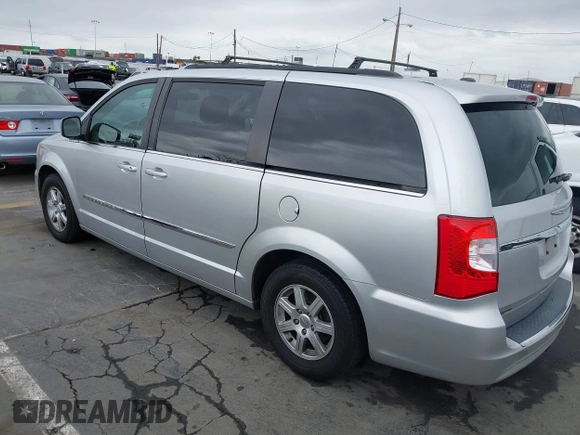 2011 Chrysler Town & Country Touring with VIN 2A4RR5DG2BR665177, listed as a IAAI auction lot 42213478 with 163,961 mi miles and . Bid and sale history available at DreamBid. Image 3.