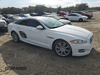 2015 Jaguar XJ with VIN SAJWA1CZ9F8V88418, listed as a Copart auction lot 45547965 with 82,423 mi miles and Salvage Title. Bid and sale history available at carsss.com. Image 4.