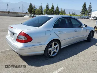 2008 Mercedes-Benz E 550 Sport with VIN WDBUF72X98B297805, listed as a Copart auction lot 61970255 with 248,178 mi miles and Salvage title. Bid and sale history available at DreamBid. Image 3.
