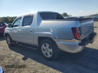 2012 Honda Ridgeline RTL with VIN 5FPYK1F55CB452206, listed as a Copart auction lot 74694204 with 128,226 mi miles and Clean Title. Bid and sale history available at carsss.com. Image 2.