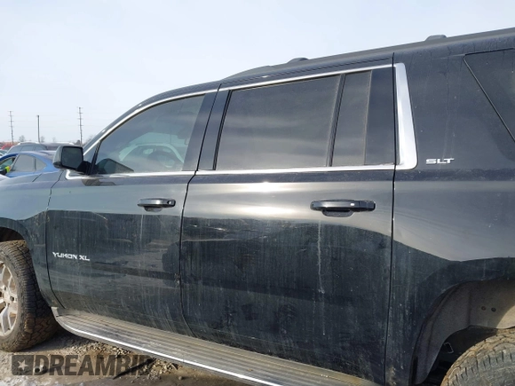 2015 GMC Yukon XL SLT with VIN 1GKS2HKC6FR257133, listed as a IAAI auction lot 41385913 with 150,238 mi miles. Bid and sale history available at carsss.com. Image 14.