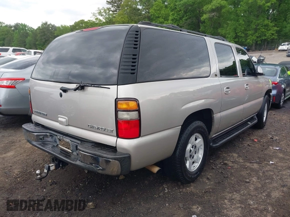2005 Chevrolet Suburban LT z VIN 3GNEC16ZX5G197892, wystawiony jako IAAI lot #42045100 z przebiegiem 262 665 mil mil oraz . Historia ofert i sprzedaży dostępna na DreamBid. Obrazek 4.