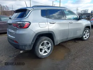 2023 Jeep Compass Latitude with VIN 3C4NJDBN7PT532099, listed as a IAAI auction lot 41485624 with 10,564 mi miles and . Bid and sale history available at DreamBid. Image 4.