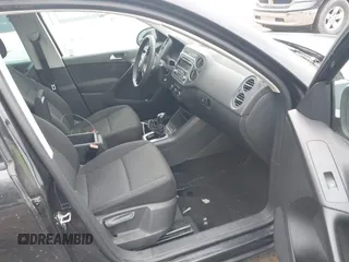 2012 Volkswagen Tiguan SE with VIN WVGAV7AX7CW609609, listed as a IAAI auction lot 41947280 with 77,942 mi miles and . Bid and sale history available at DreamBid. Image 5.