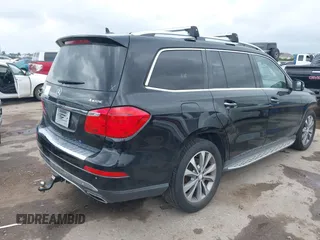 2014 Mercedes-Benz GL 450 with VIN 4JGDF7CE0EA372225, listed as a IAAI auction lot 42141012 with 158,045 mi miles and . Bid and sale history available at DreamBid. Image 4.