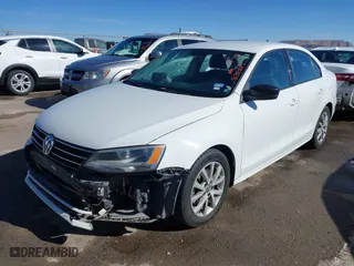 2015 Volkswagen Jetta Sedan 1.8T Sport with VIN 3VWD17AJXFM262125, listed as a IAAI auction lot 41343125 with 151,823 mi miles. Bid and sale history available at carsss.com. Image 17.