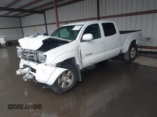 2010 Toyota Tacoma PreRunner with VIN 3TMKU4HN6AM026668, listed as a IAAI auction lot 41786901 with 267,485 mi miles and . Bid and sale history available at DreamBid. Image 2.